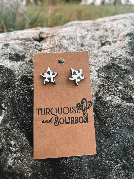 Cow print star earrings